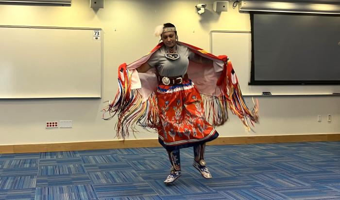 Nishke Mars demonstrated the fancy shawl dance. Nishke Mars demonstrated the fancy shawl dance.