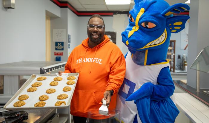 If you see a Wyvern with cookie crumbs on its wings it's because the cafeteria has the best snacks! If you see a Wyvern with cookie crumbs on its wings it's because the cafeteria has the best snacks!