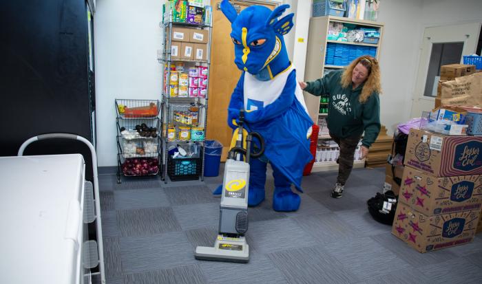 Wyverns aren't afraid of hard work, especially in the HomePlate Food Pantry & Resource Center Wyverns aren't afraid of hard work, especially in the HomePlate Food Pantry & Resource Center