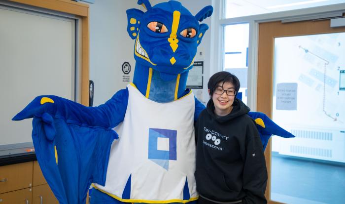 Smiles are contagious when QCC's Wyvern mascot is around Smiles are contagious when QCC's Wyvern mascot is around