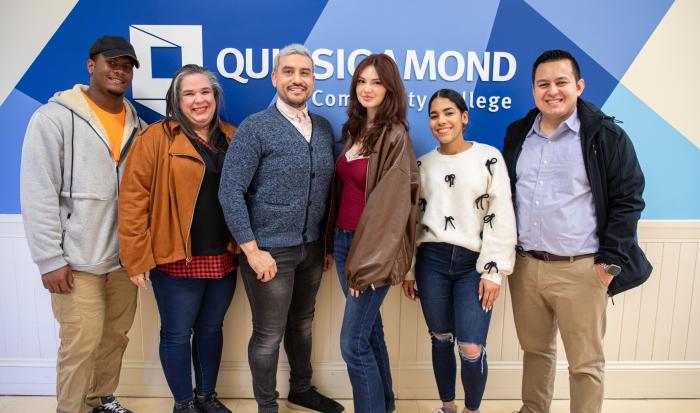 QCC students (from left) Melvin Minaya, Wanda Morales, Joshua Roman, Arielle Bento and Genesis Paulino with Associate Professor of Accounting Eduardo Rivas QCC students (from left) Melvin Minaya, Wanda Morales, Joshua Roman, Arielle Bento and Genesis Paulino with Associate Professor of Accounting Eduardo Rivas