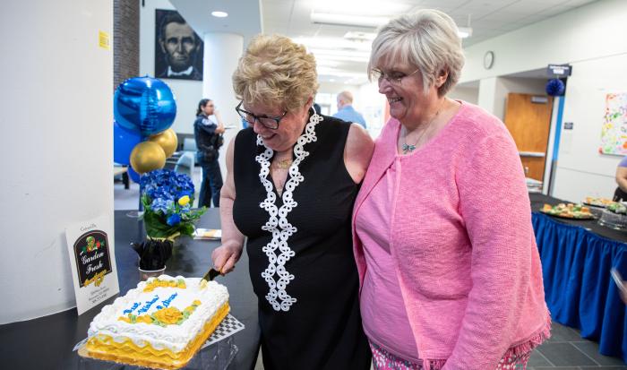Dean of Compliance Liz Woods (left) and Dental Clinic Operations and Facilities Manager Sheryl Ficorilli enjoy well deserved treats Dean of Compliance Liz Woods (left) and Dental Clinic Operations and Facilities Manager Sheryl Ficorilli enjoy well deserved treats