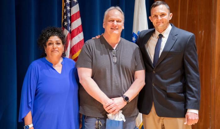 (From left) Director of Athletics & Fitness Center Lisa Gurnick, Mail Clerk II Rich Small, and Assistant Director of Athletics & Fitness Center Josh Cole