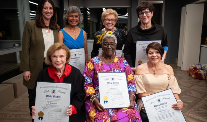 Former and current HACE committee members (back row from left, Sen. Robyn Kennedy, Maria Addison, Pat Toney and Ann Lisi, (front row, from left) former Sen. Harriette Chandler, Rafaela Morales and Olga Lopez Hill