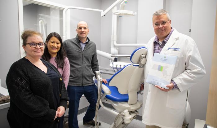 (From left) The Health Foundation Director of Finance and Administration Michelle L. Ewing, The Health Foundation President and CEO Amie Shei, The Health Foundation Grants and Operations Manager Daniel P. Germain and Dean of the School of Healthcare Pat Schmohl