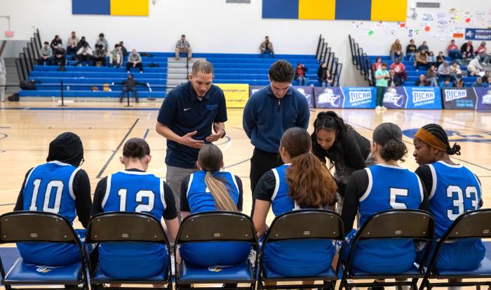 Coaches and players strategize at the NJCAA Region 21 Tournament