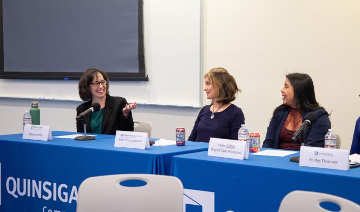 Shannon Smith (left) talks about leadership at the EmpowerHER panel.