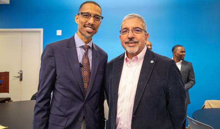 Dr. Stefan Bradley (left) with QCC President Dr. Luis Pedraja