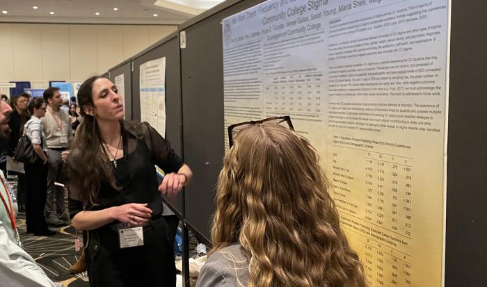 Maria Snell presenting QCC's research to conference attendees