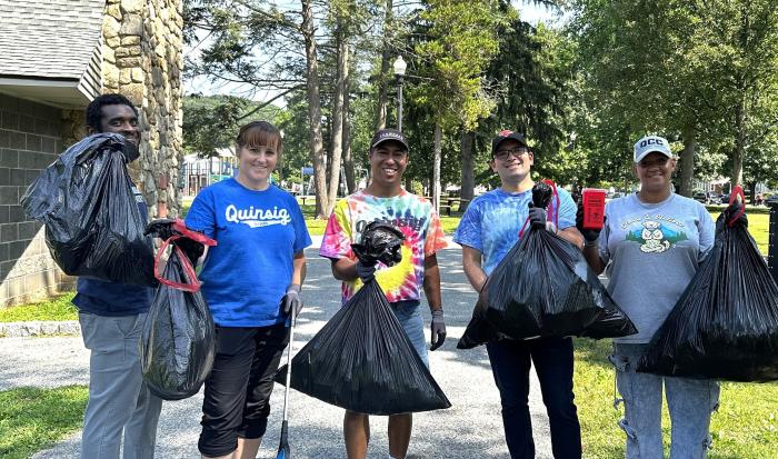 The trash at Elm Park didn't stand a chance with this team: (from left) Adjunct Faculty Member Henry Chambers, Coordinator of Career Services Nichole Wheeler, Coordinator of Transfer & Articulation Oscar Chavez, Director of Foundational Excellence and Student Development Gabe Santner and First Generation Student Association SantaMaria Sessarego