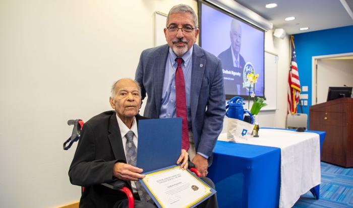 Professor of Engineering Dadbeh Bigonahy with QCC President Dr. Luis Pedraja (right)