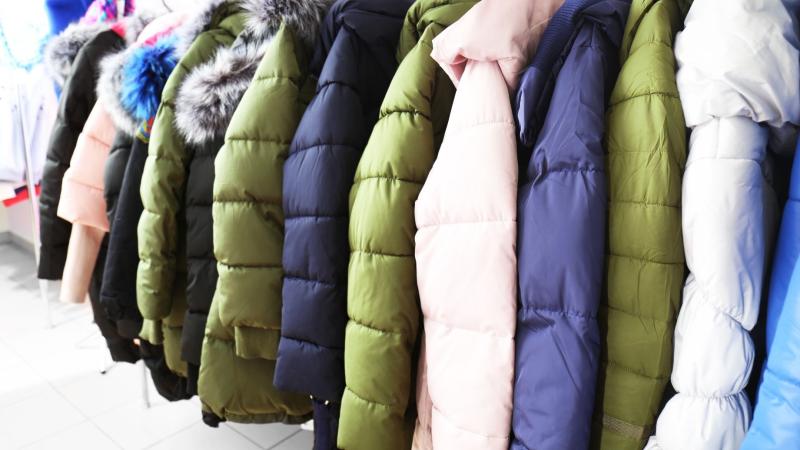 coats hanging on a rack