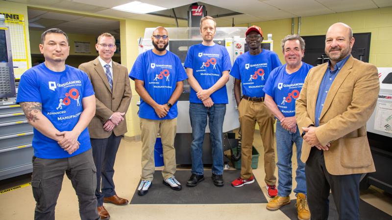 Students receiving Haas CNC certificates with David Schmidt and Professor Lee Duerden (right).