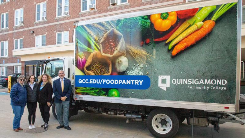 Manager for Student Resources Bonnie Coleman, Food Pantry Staff Julia Rooney, Food Pantry Staff Cheryl Marrino and President Dr. Luis Pedraja