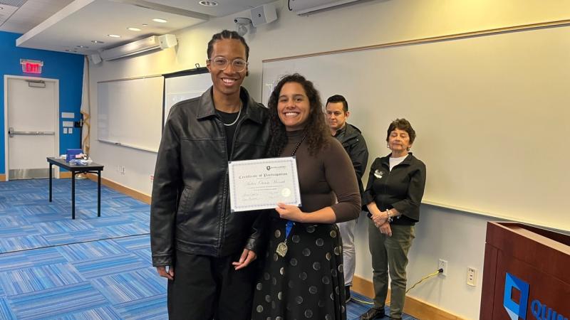 Coordinator of the Future Focus Program Gilmarie Vongphakdy (right) with a student