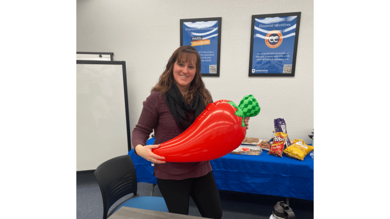 Coordinator of Career Services & Credit for Prior Learning Nichole Wheeler with her prize for winning a chili contest