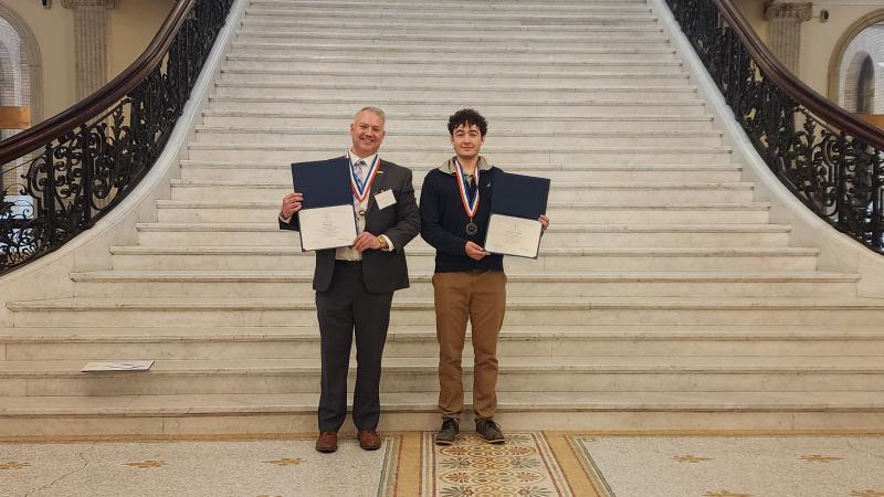 Jon Sawyer (left) and Quint Kunar-Hallas at the Massachusetts State House