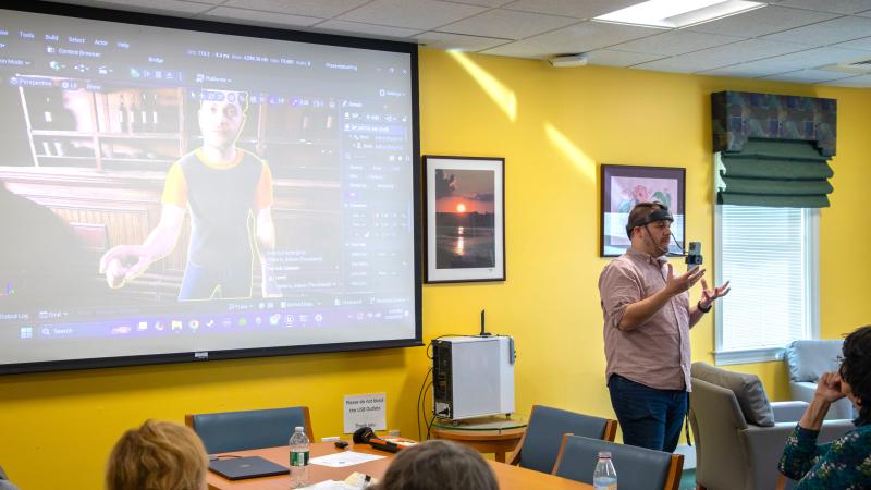 Learning Manager for Media Design Nate Mellow shows off some IMD equipment.