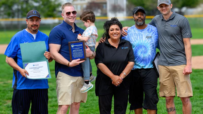 (From left) Men’s Head Baseball Coach Corey Coleman, President of the Worcester Bravehearts Matt Vaccaro with son Luca, Director of Athletics & Fitness Center Lisa Gurnick, Director of Community Engagement Sean Harris and Assistant Director of Athletics & Fitness Center Josh Cole. 