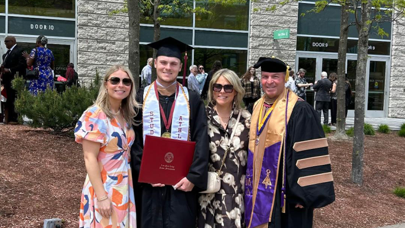 QCC alum Larry Sasso (right) with his family.
