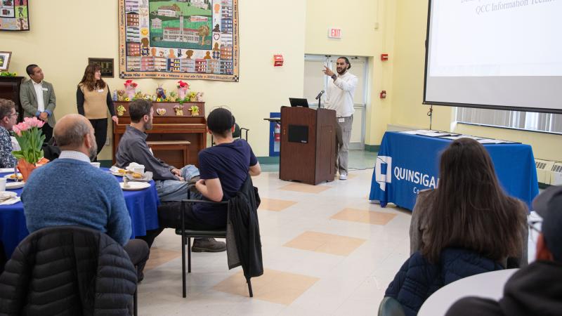 Desktop Support Technician Nader Baker speaks at the Co-Op Breakfast.