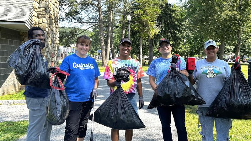 The trash at Elm Park didn't stand a chance with this team: (from left) Adjunct Faculty Member Henry Chambers, Coordinator of Career Services Nichole Wheeler, Coordinator of Transfer & Articulation Oscar Chavez, Director of Foundational Excellence and Student Development Gabe Santner and First Generation Student Association SantaMaria Sessarego