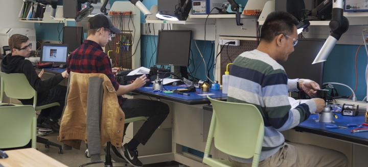 Students working on projects in the electronics lab