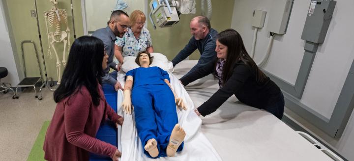 Students in lab discuss radiographic imaging