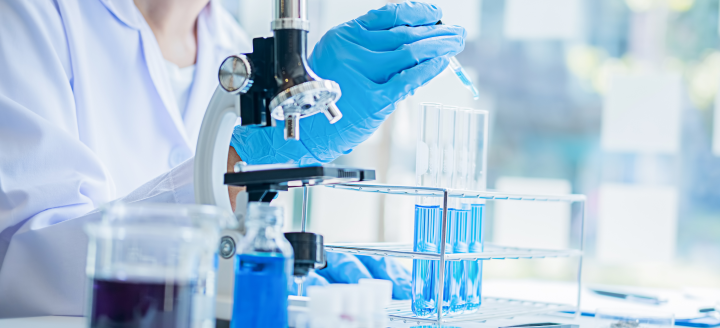 A biology lab table with various equipment