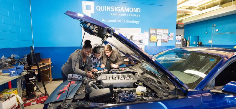 QCC students work on a vehicle