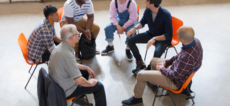 A group participates in counseling.