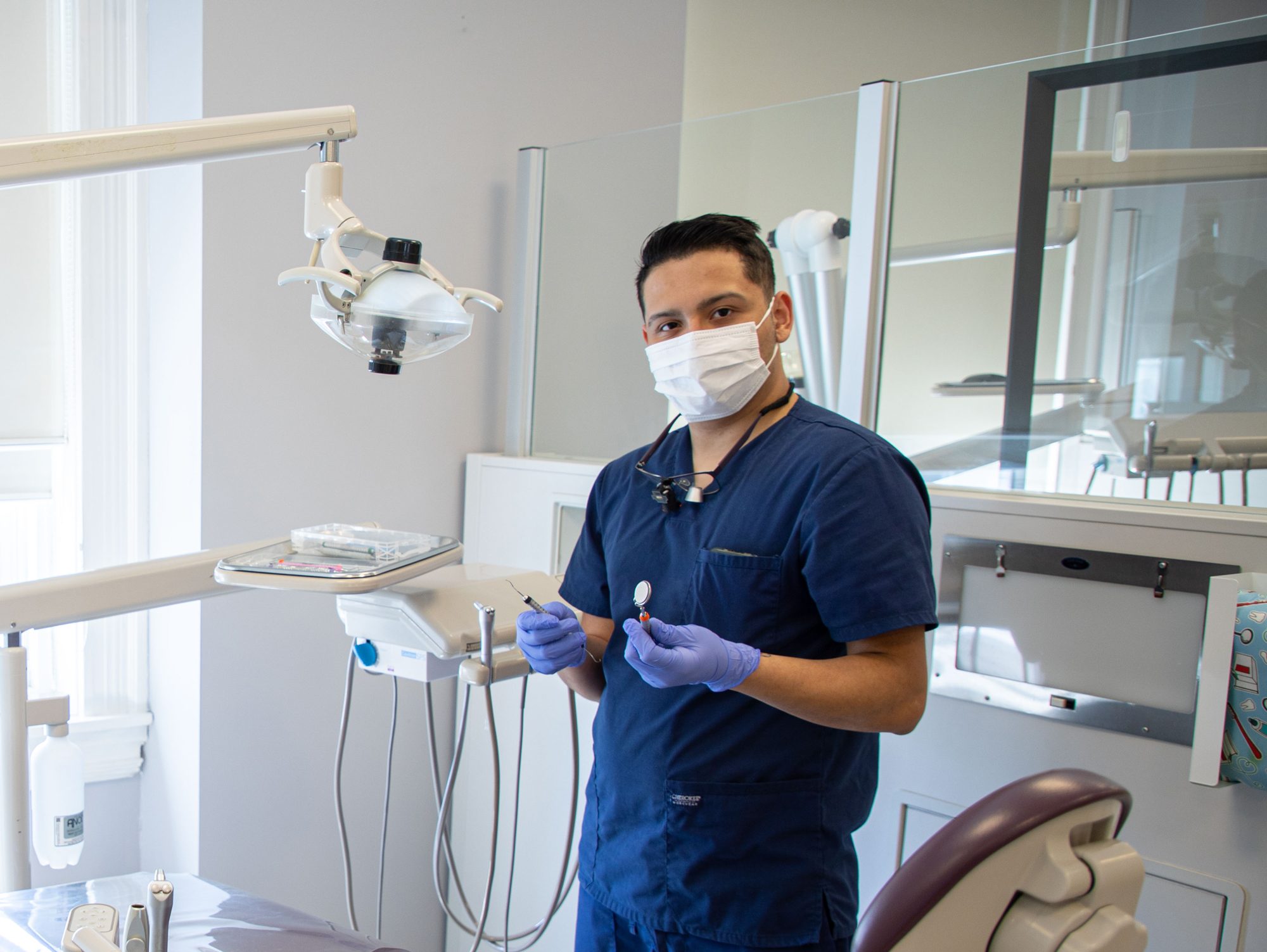 A dental student in a lab.